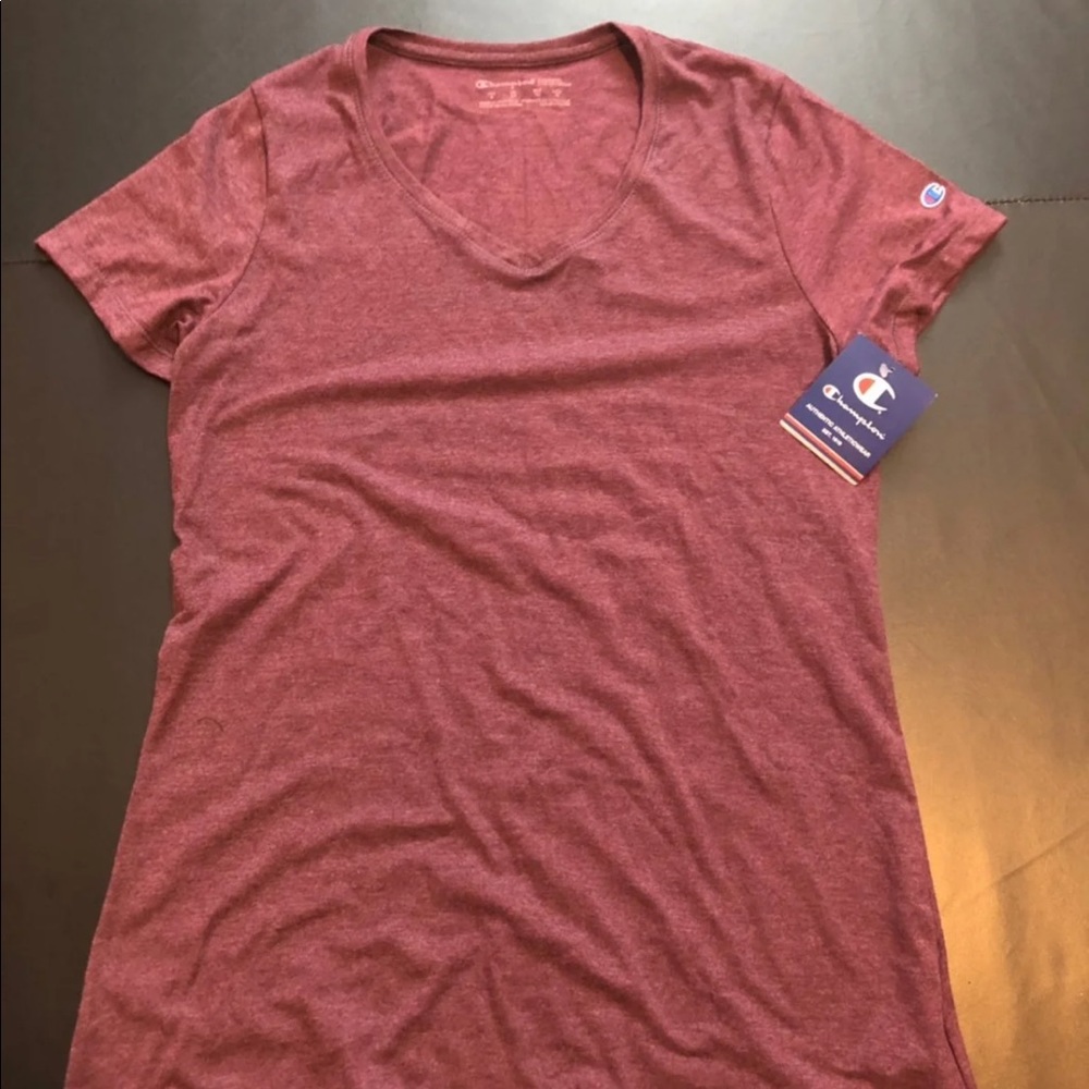 New champion tee